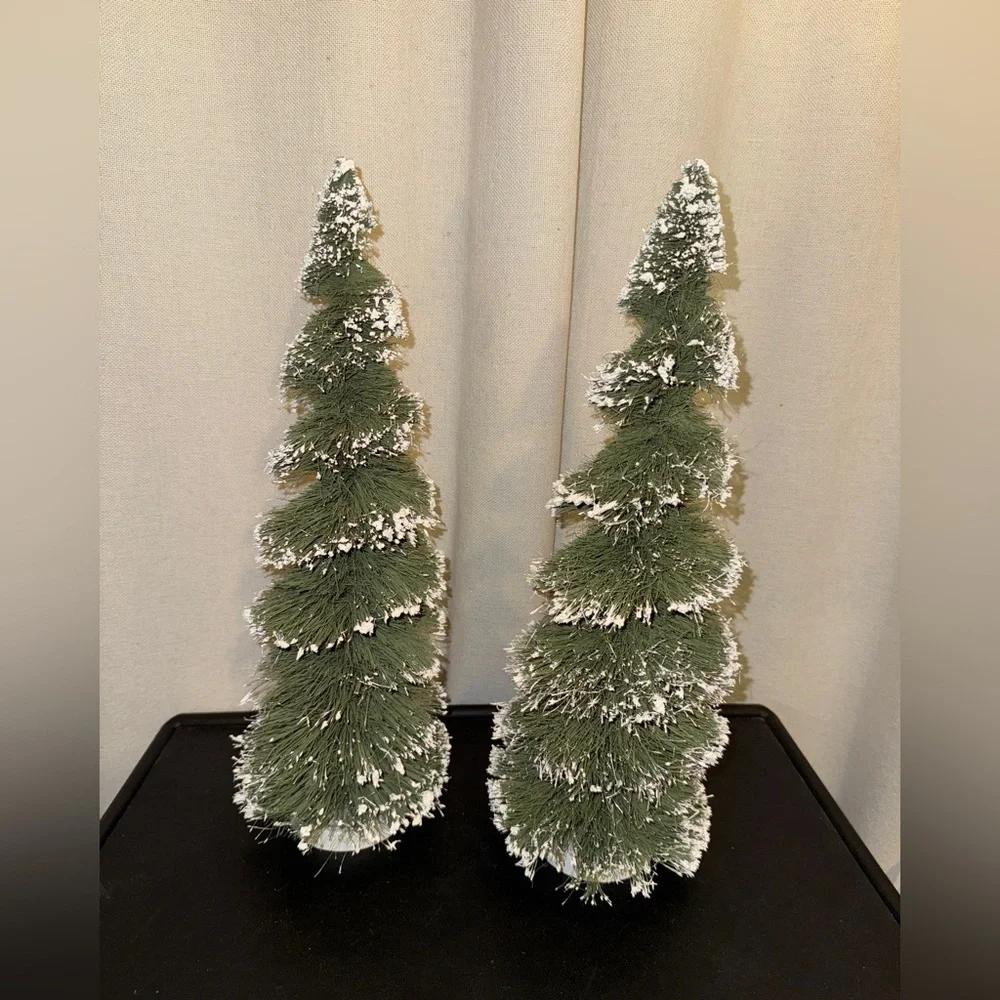 Two large bottle brush trees
